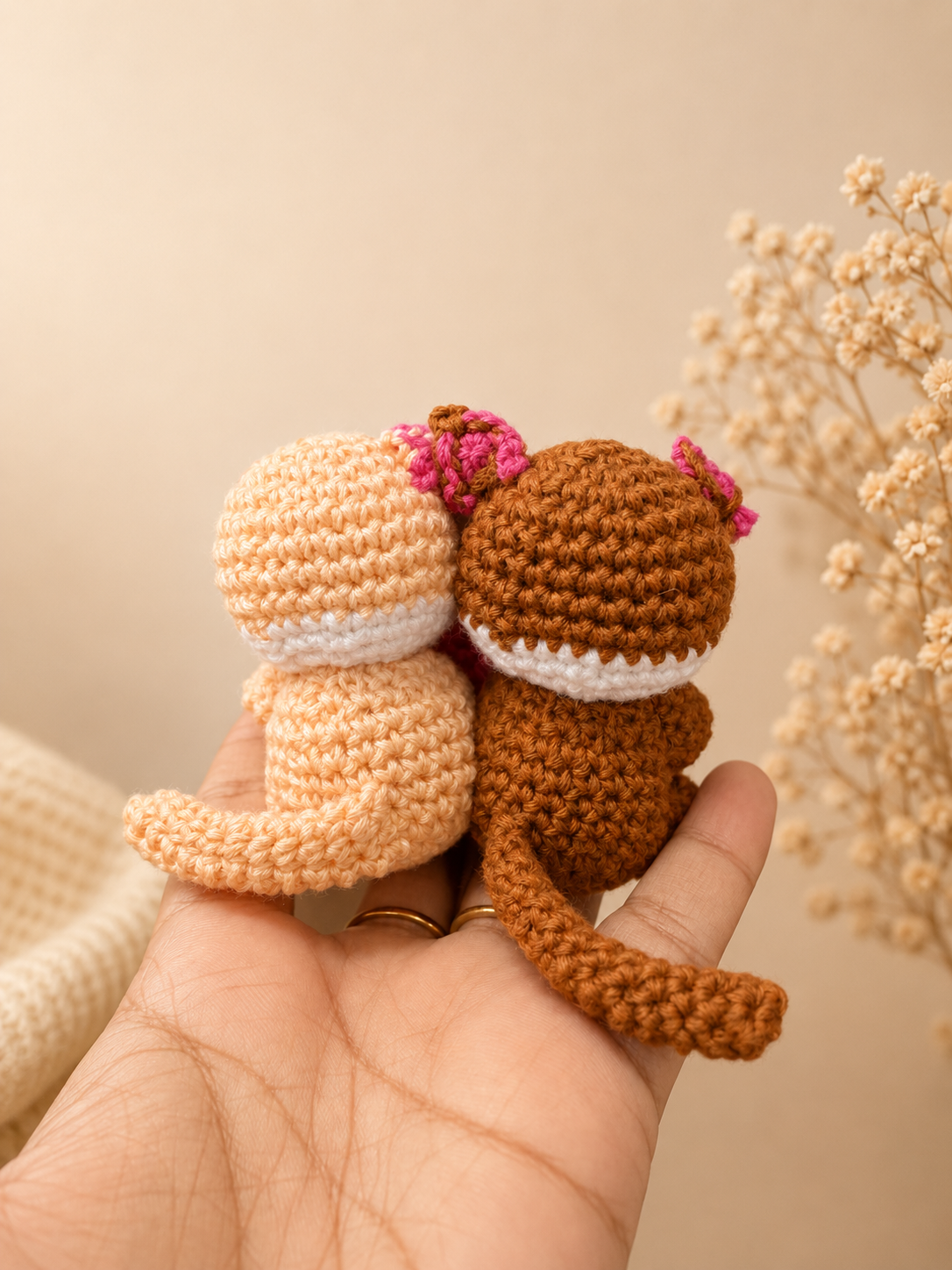Handcrafted crochet cat couple holding a pink heart, handmade plush keepsake by The Hook Project