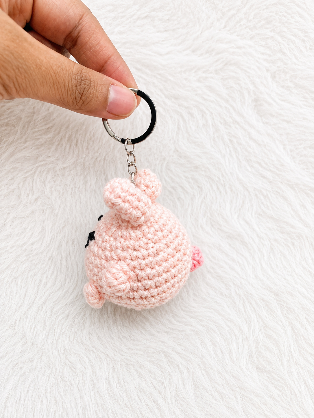 Handcrafted crochet chick keychain in pink and blush cotton yarn with metal keyring, handmade character accessory by The Hook Project