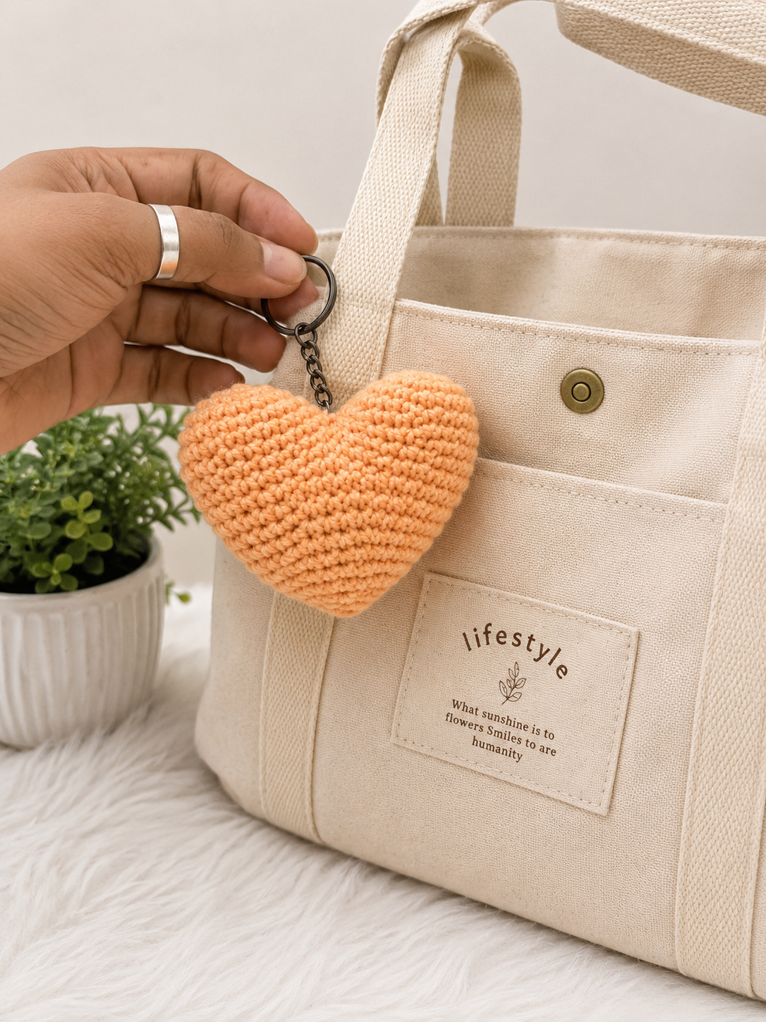 Handcrafted peach crochet heart keychain with metal keyring, handmade cotton yarn accessory by The Hook Project