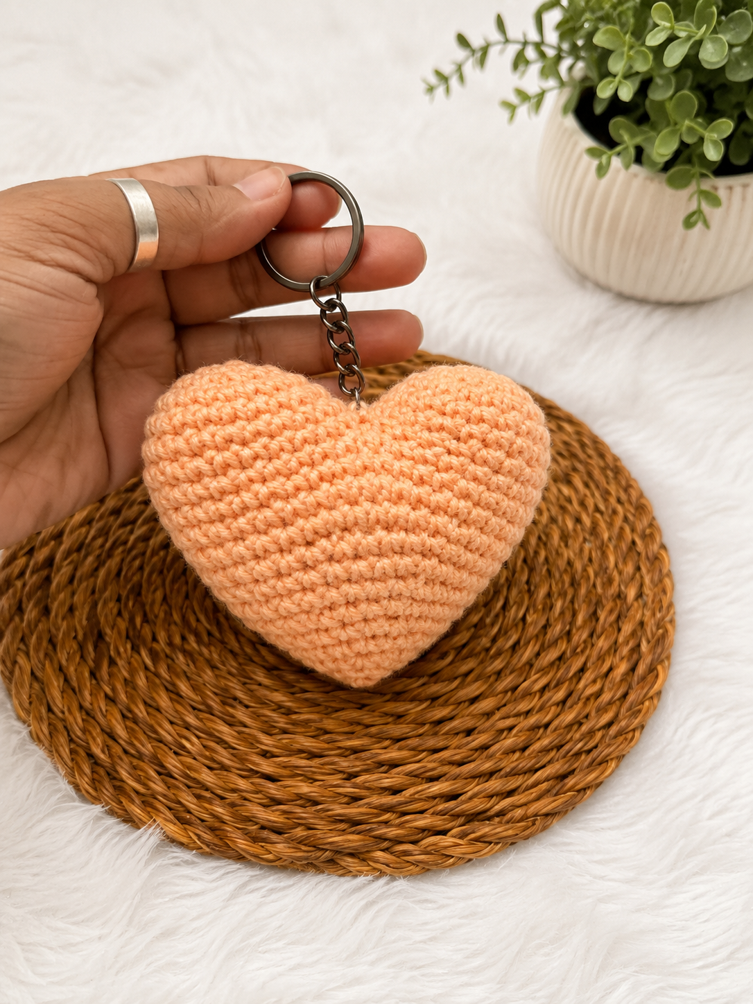 Handcrafted peach crochet heart keychain with metal keyring, handmade cotton yarn accessory by The Hook Project