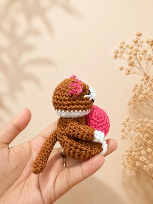 Handcrafted crochet cat couple holding a pink heart, handmade plush keepsake by The Hook Project